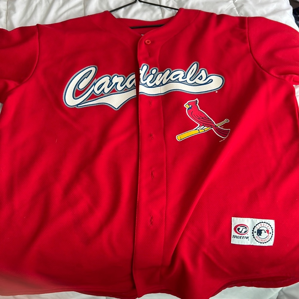 Red Cardinals baseball jersey.  McGwire 25